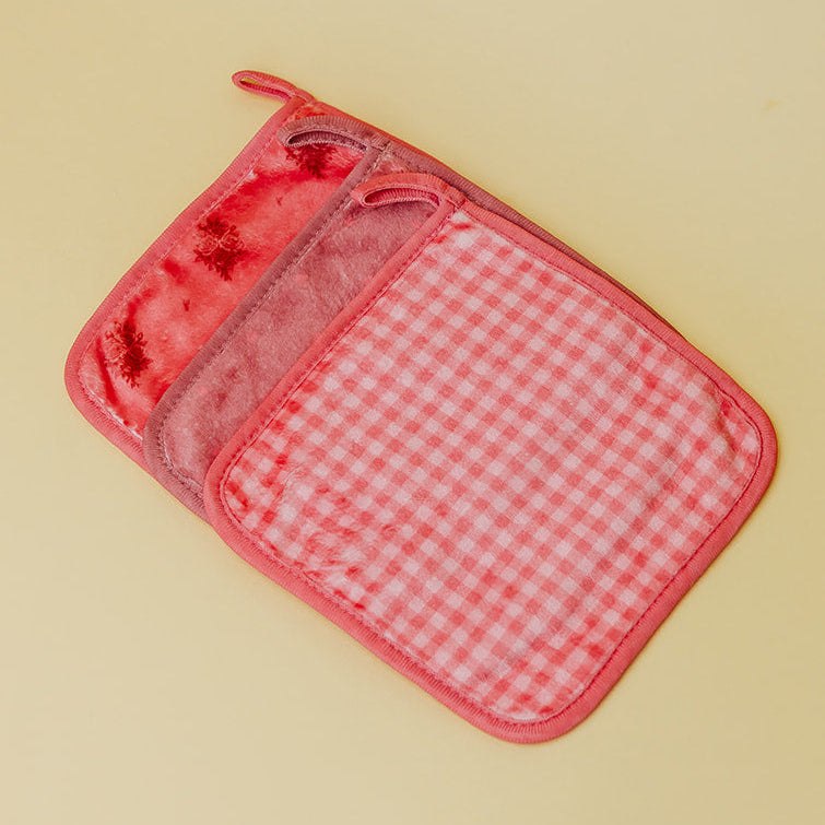 Red checkered pot holder on a beige background