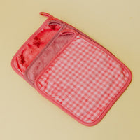 Red checkered pot holder on a beige background