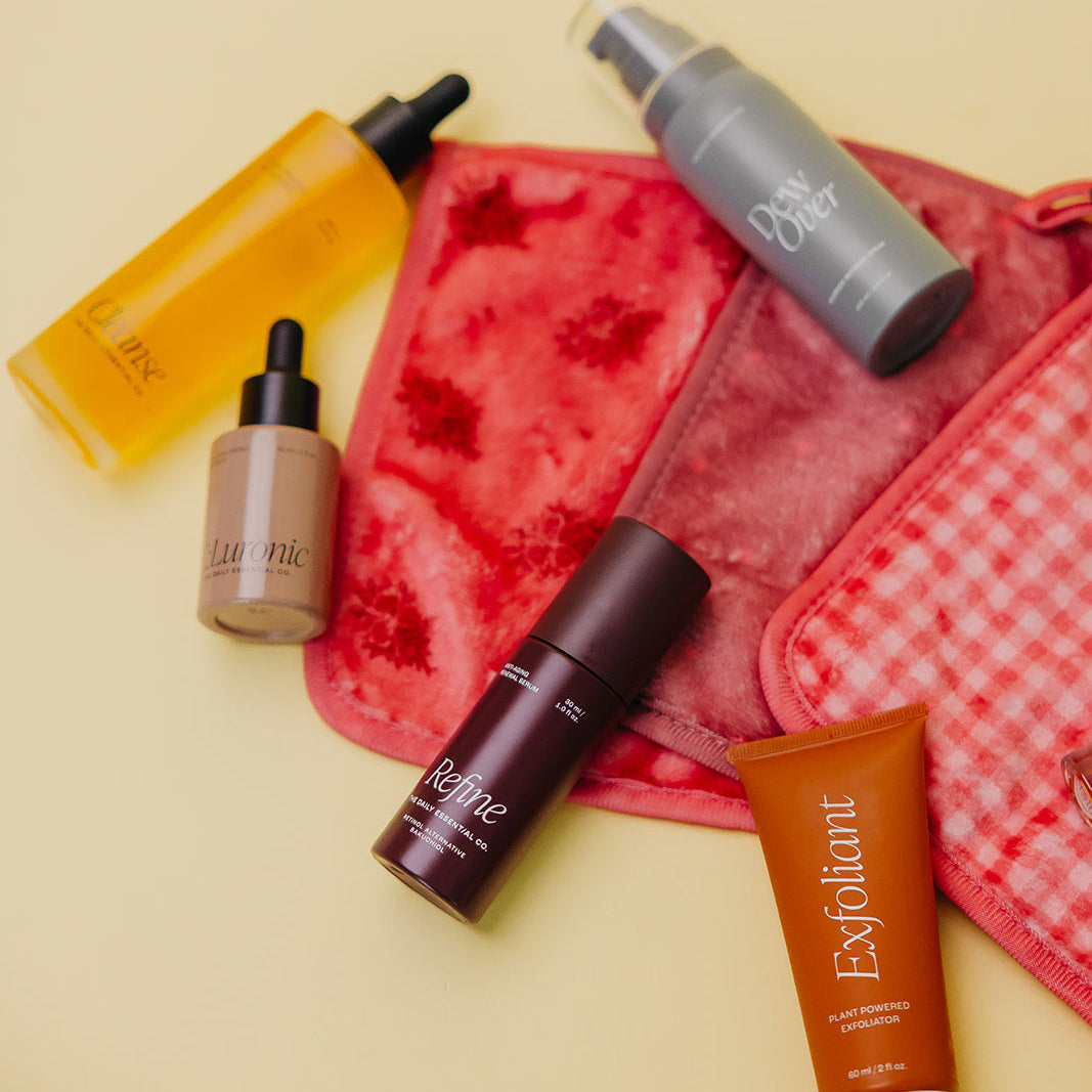 Collection of skincare products on a yellow background