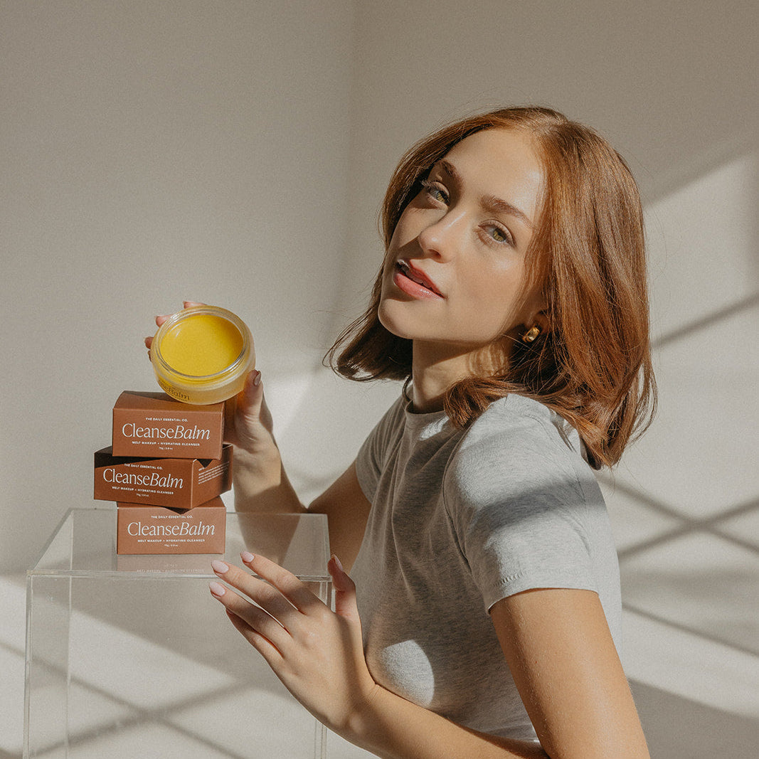 girl with cleanse balm product
